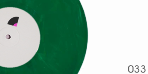 Vinyle marbré vert transparent-noir-brun-orange pastel